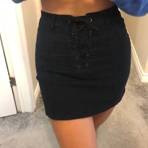 Black corduroy skirt with lace up detail